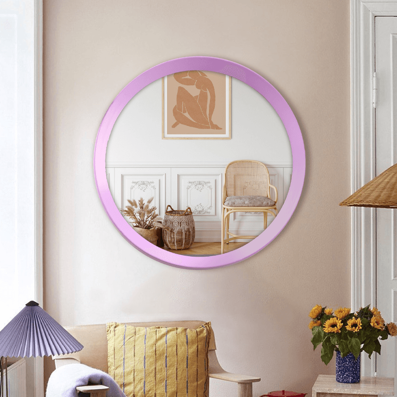 مرآة مستديرة باللون الوردي