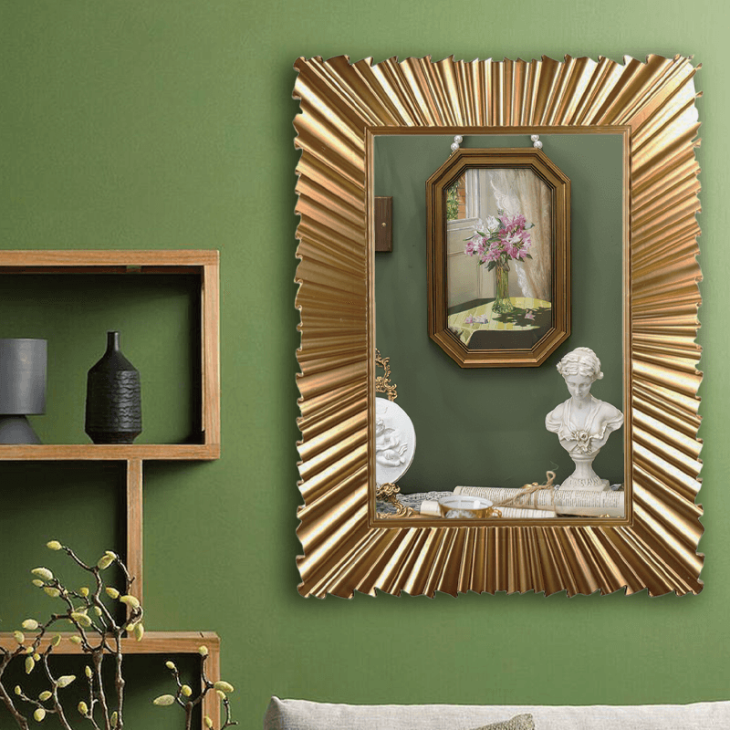 مرآة عصرية لتزيين الحائط باللون الذهبي
